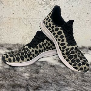 Leopard print/ irregular polka dot athletic shoe.